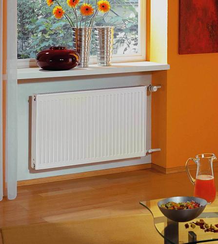 Purmo Compact С22 900x700 стальной панельный радиатор с боковым подключением